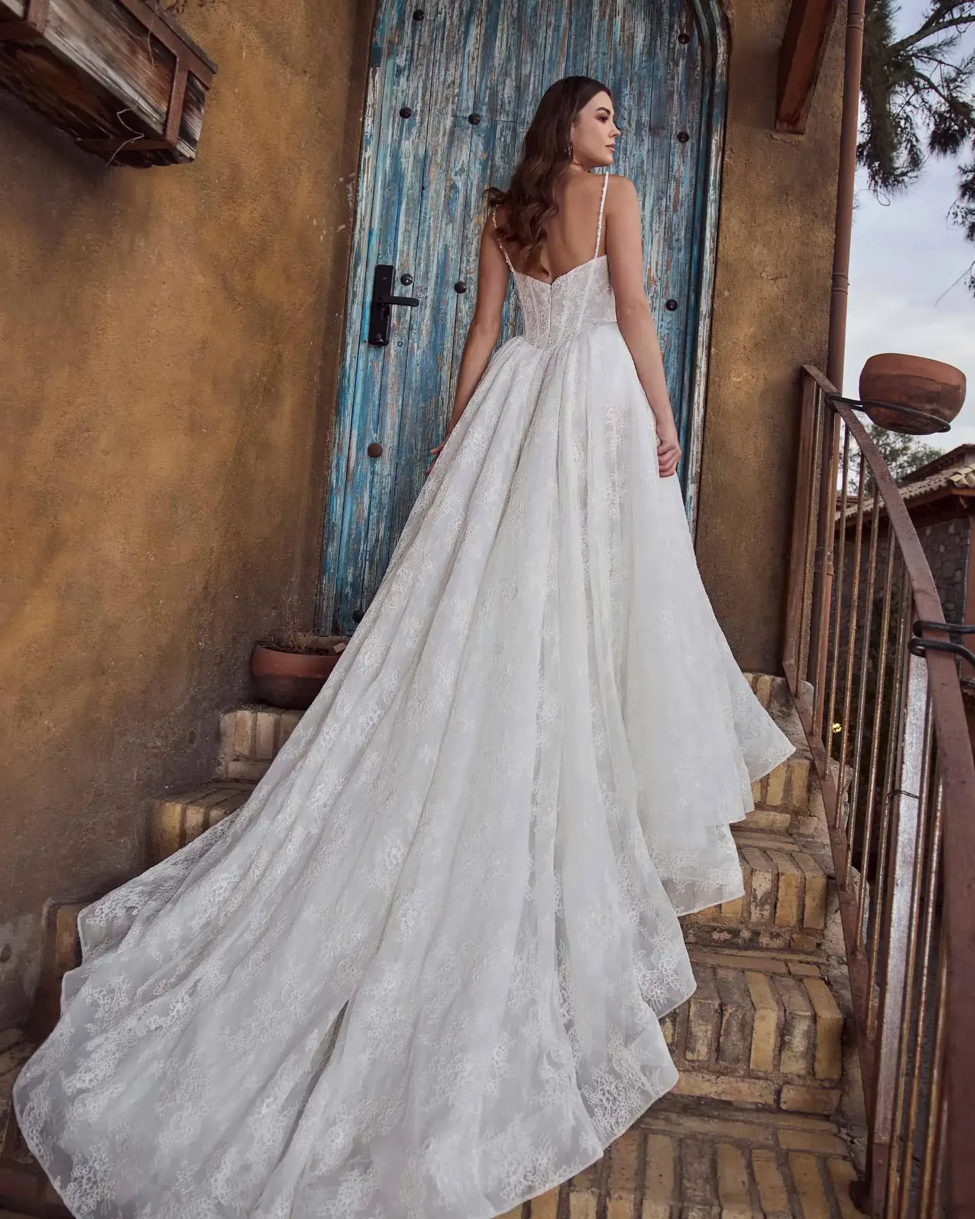 model is wearing a strapless basque waist wedding gown