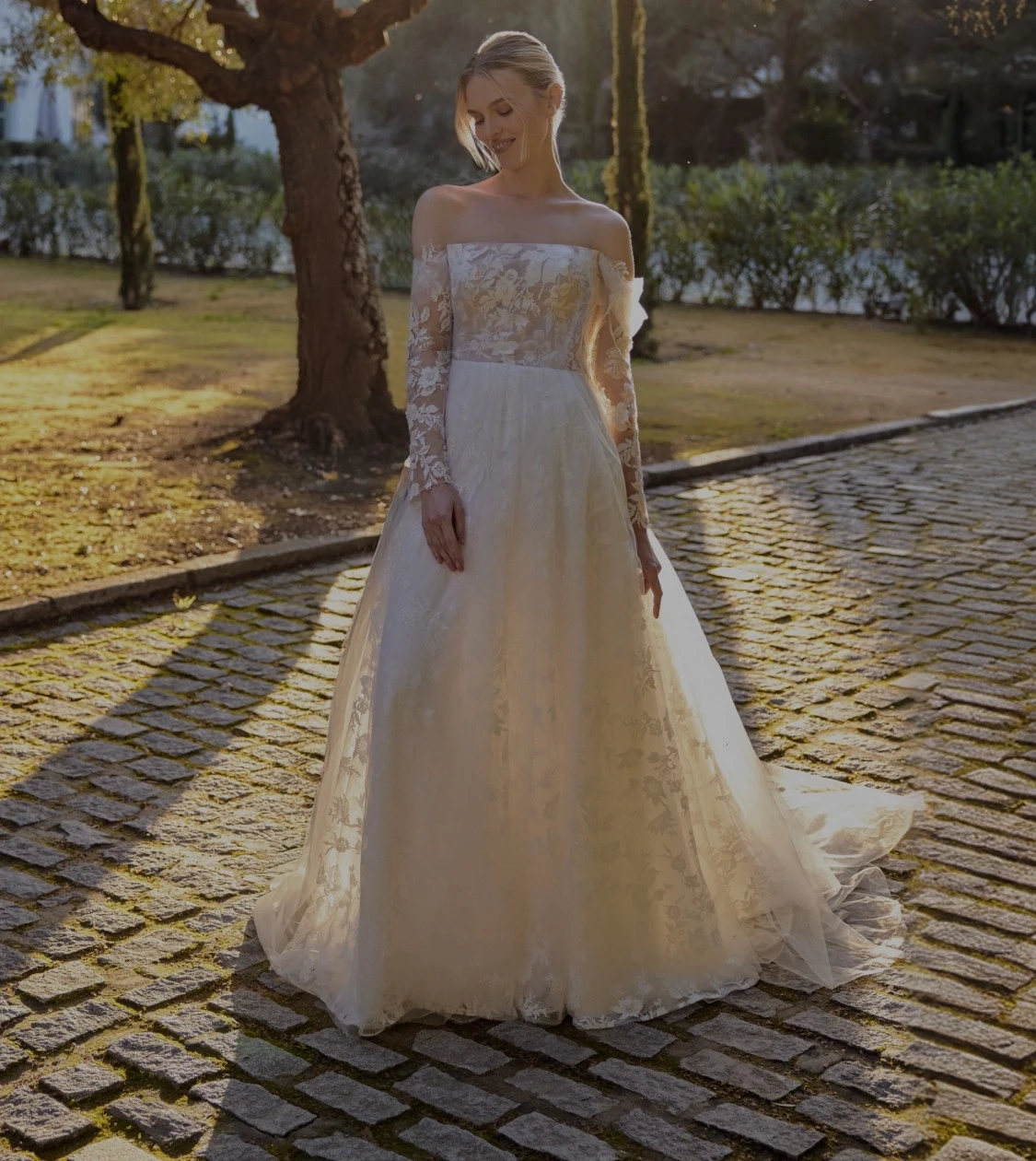 Model wearing a bridal dress. Mobile image